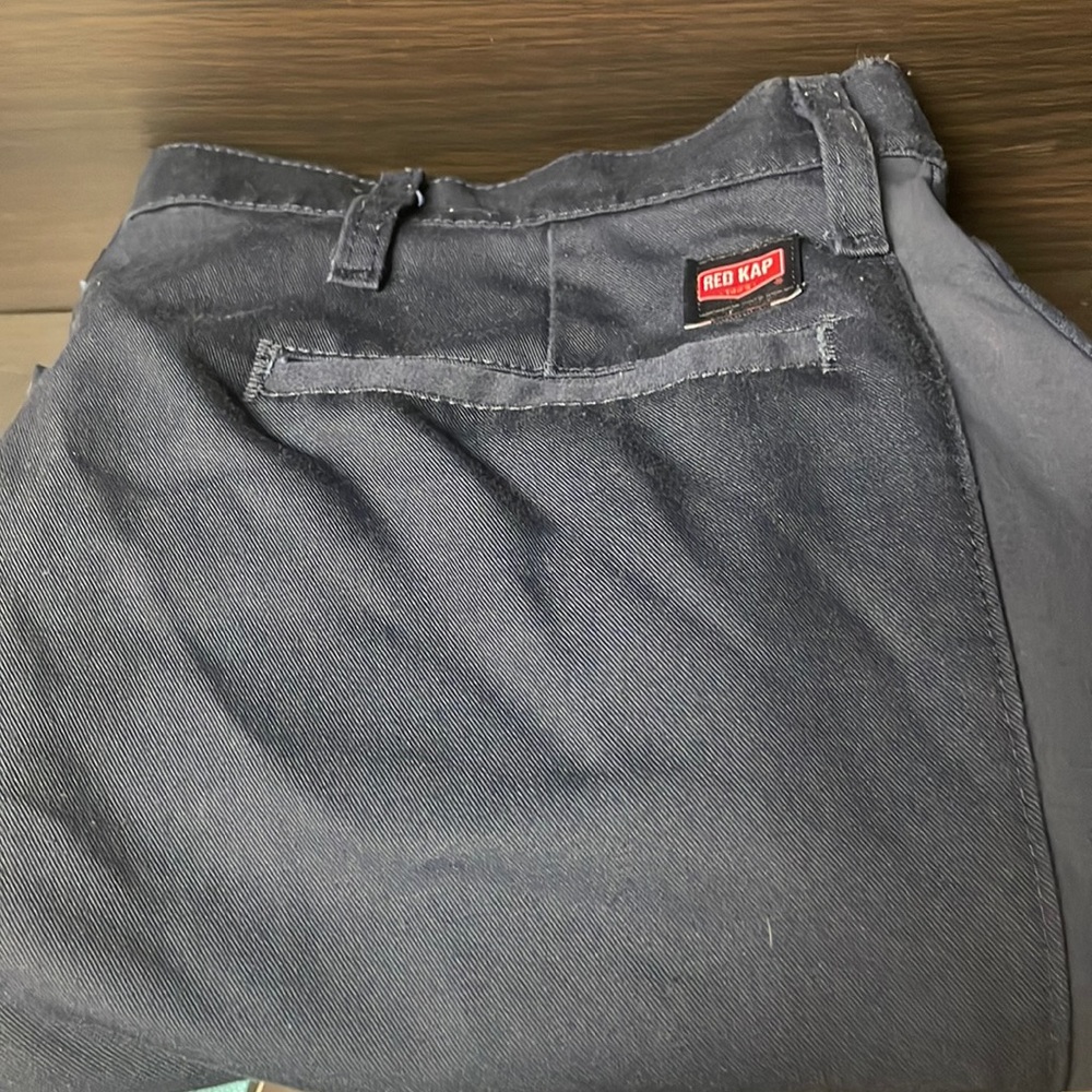 Red Kap work pants.